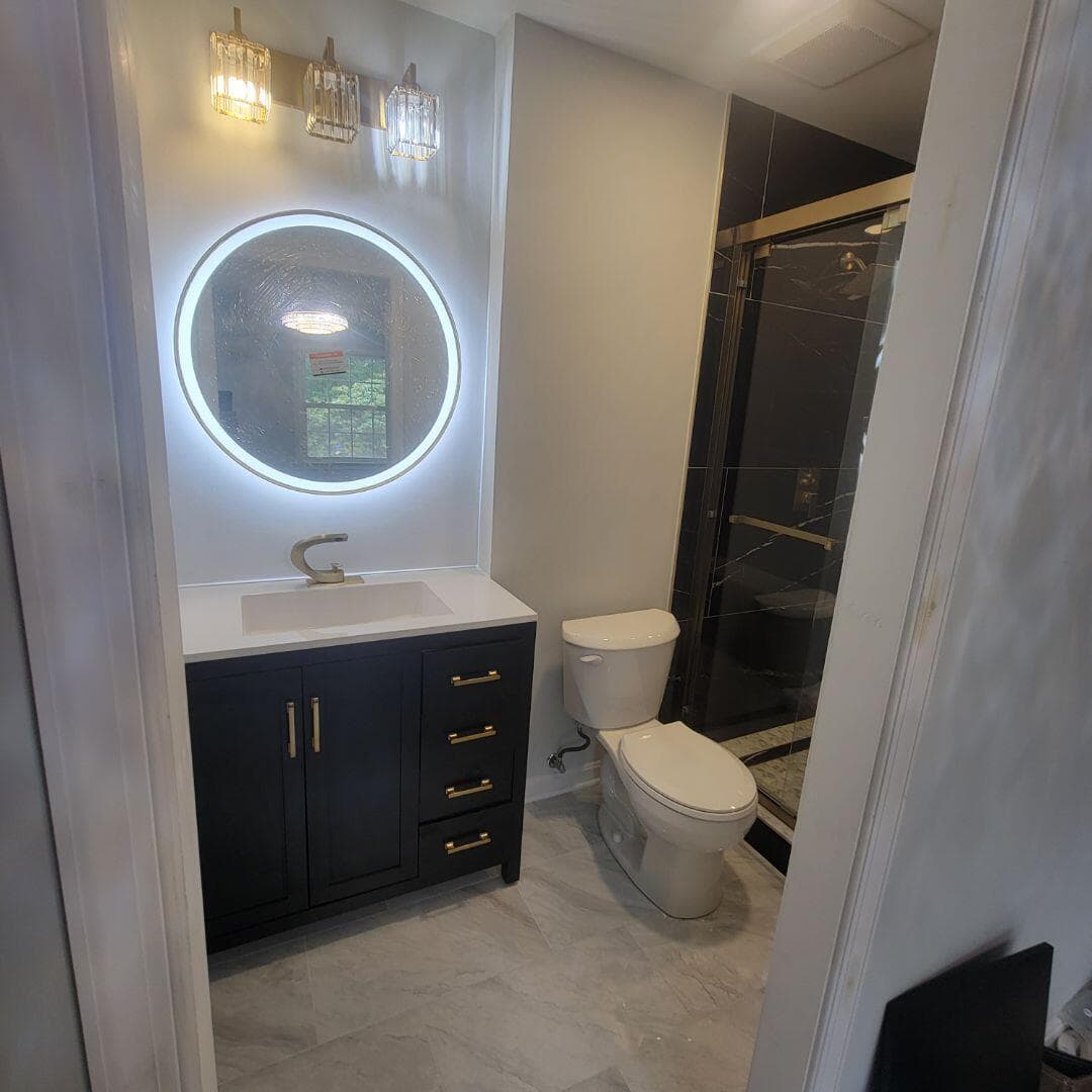 Modern vanity installation by Ventura Home Improvement