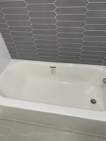 Bathtub installation with custom tile surround