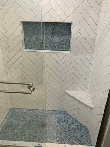 Large format tile shower build by Ventura