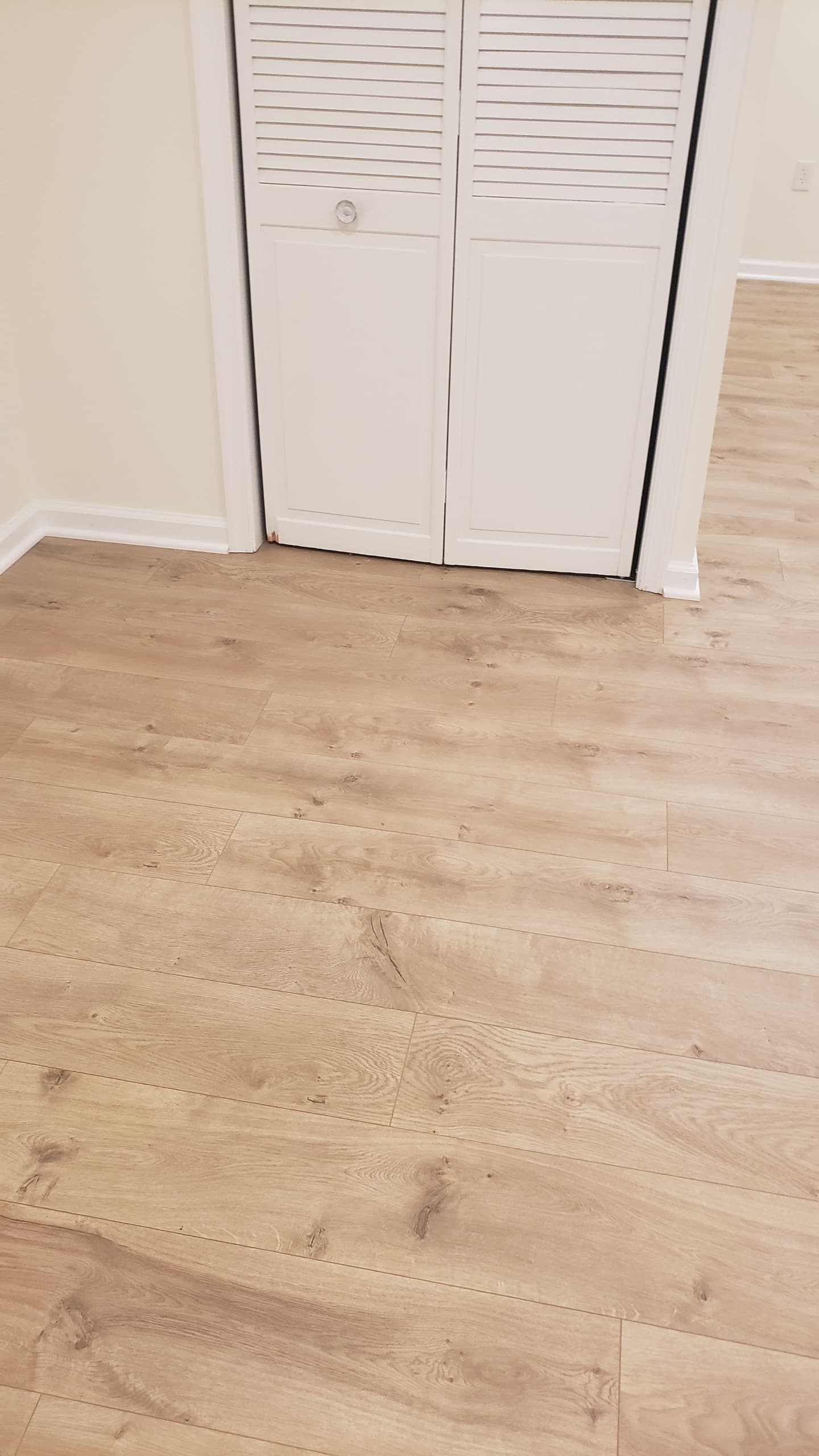 Light oak LVP flooring bedroom installation Northern Virginia