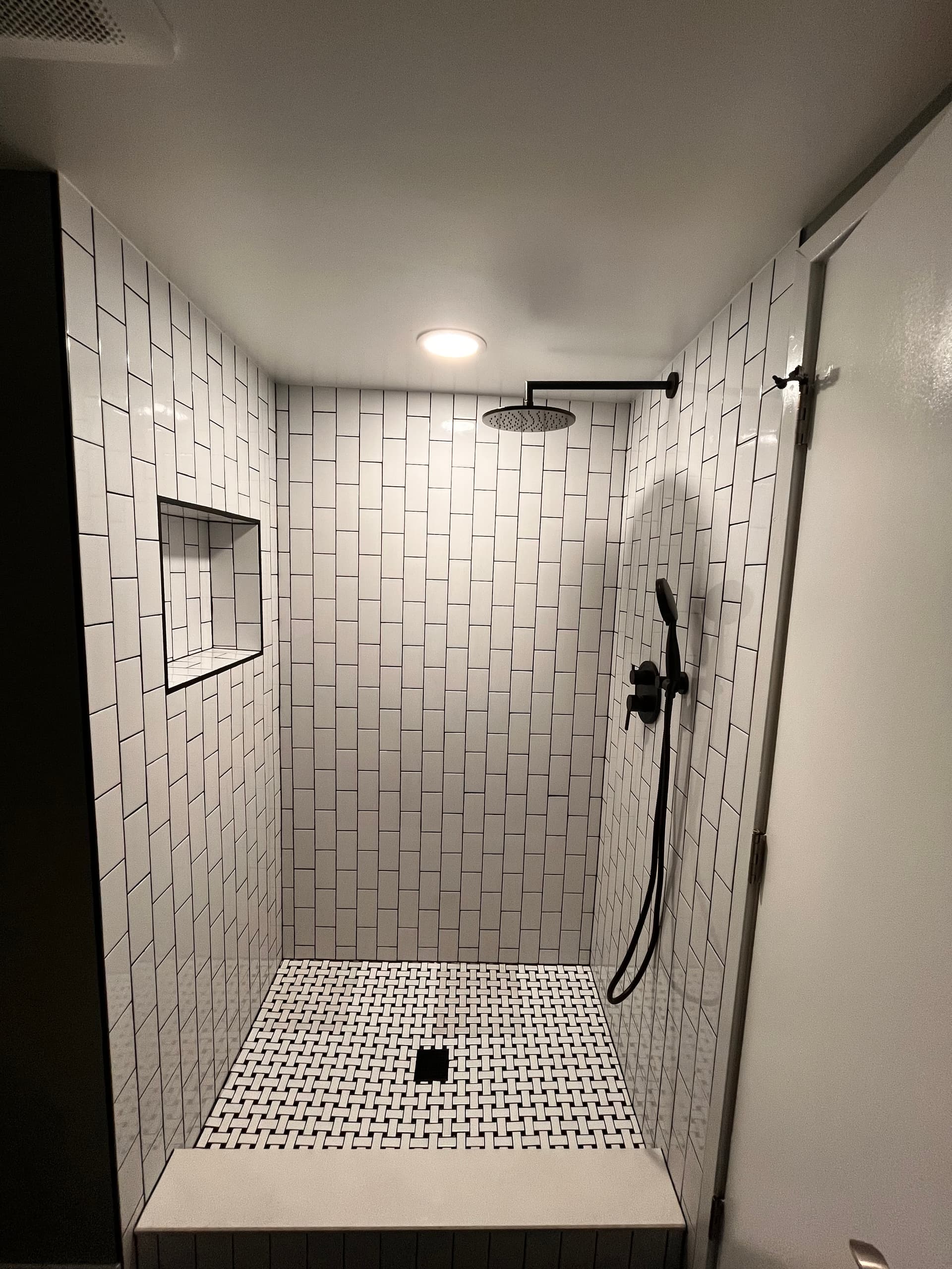 White shower renovation with modern fixtures Northern Virginia