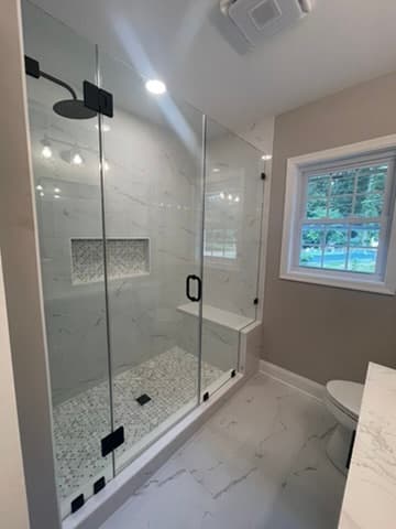 White shower build overview by Ventura Home Improvement