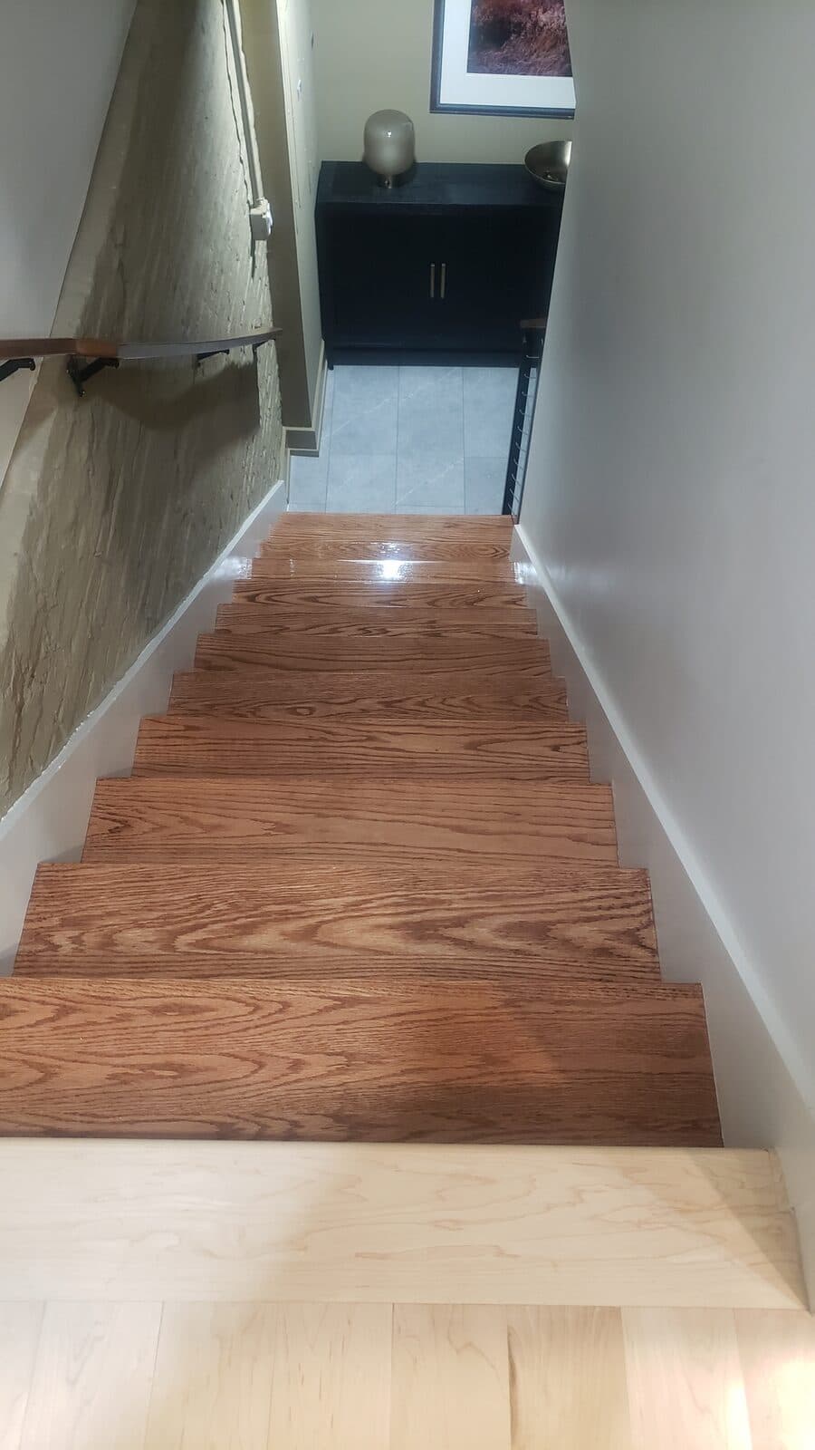 Brown oak staircase remodel with painted risers Northern Virginia