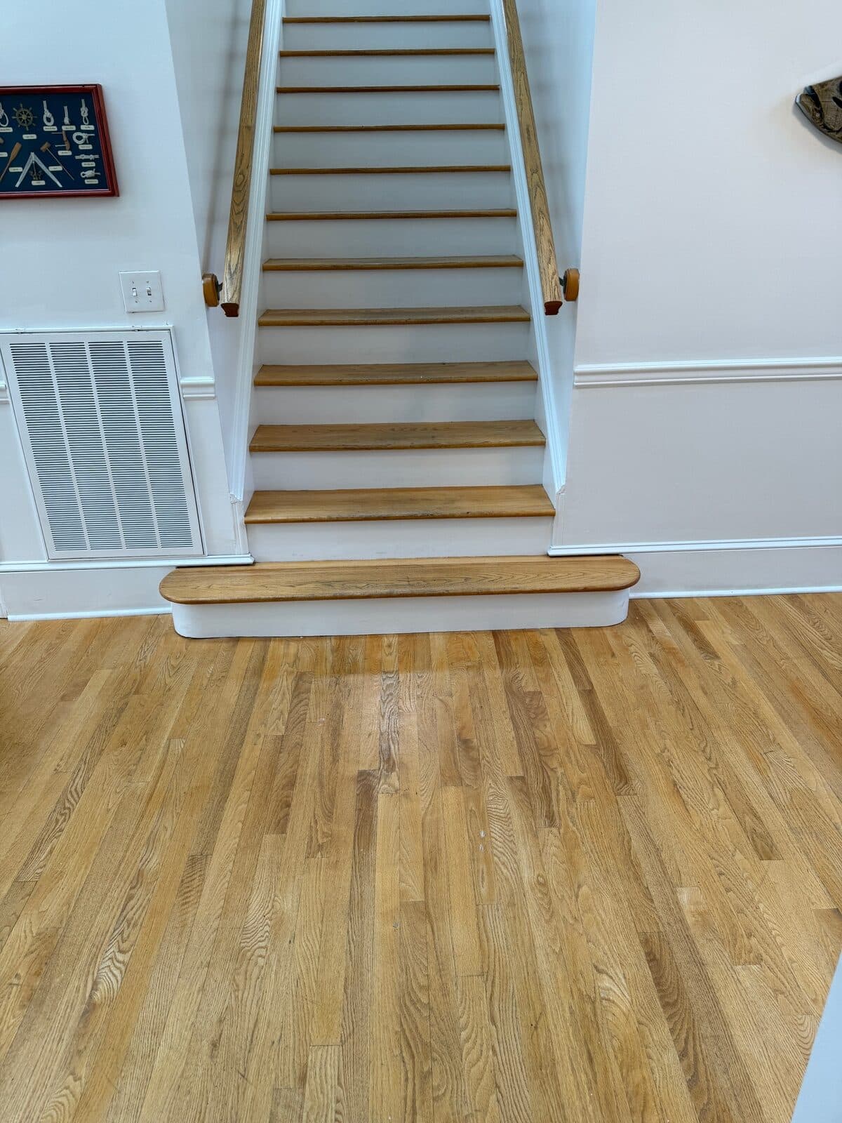 Light wood staircase renovation by Ventura Home Improvement