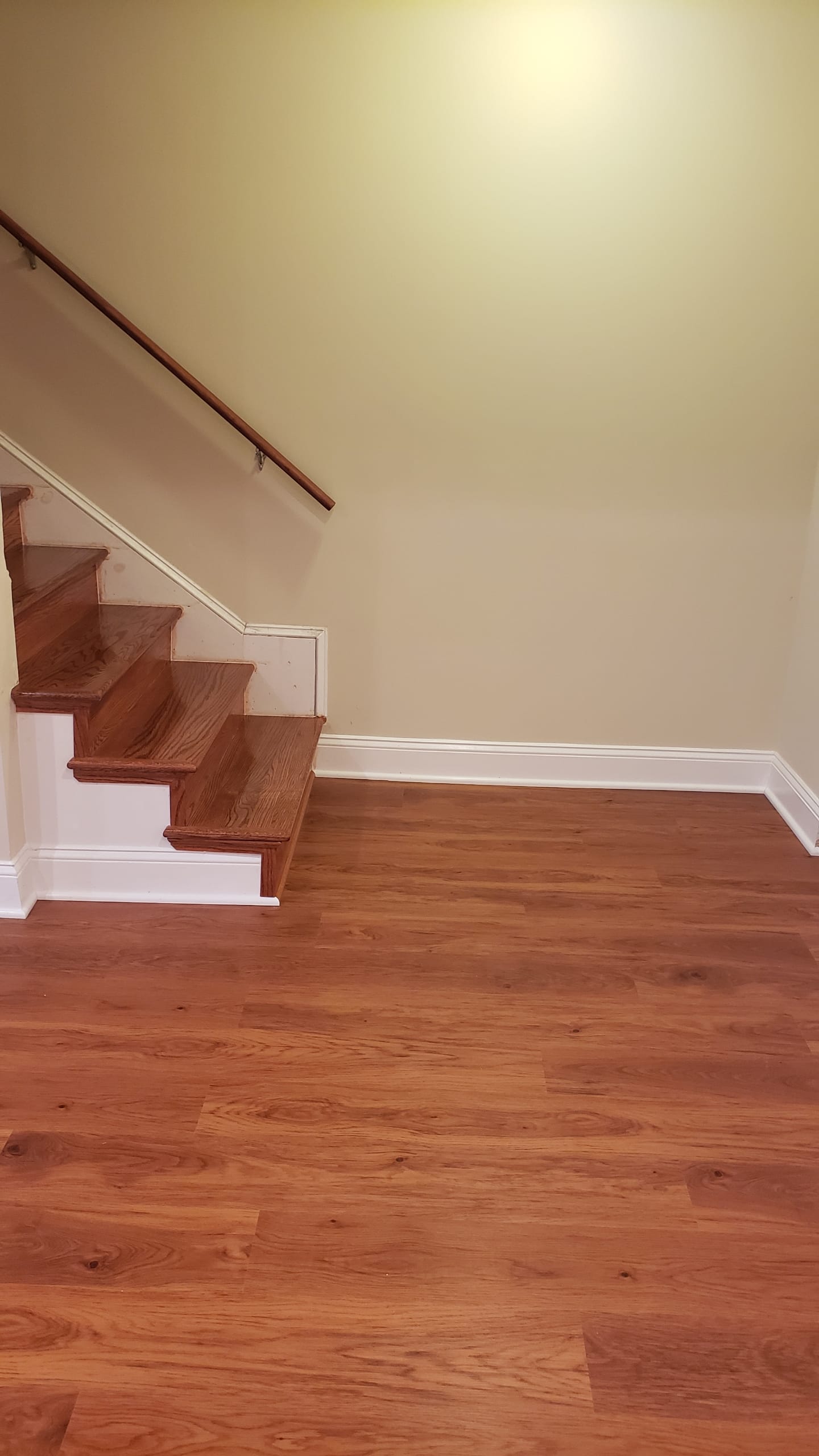 Red oak hardwood flooring with matching staircase Northern Virginia