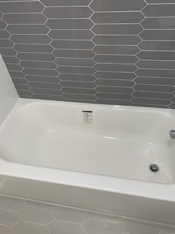 Bathtub installation with custom tile surround
