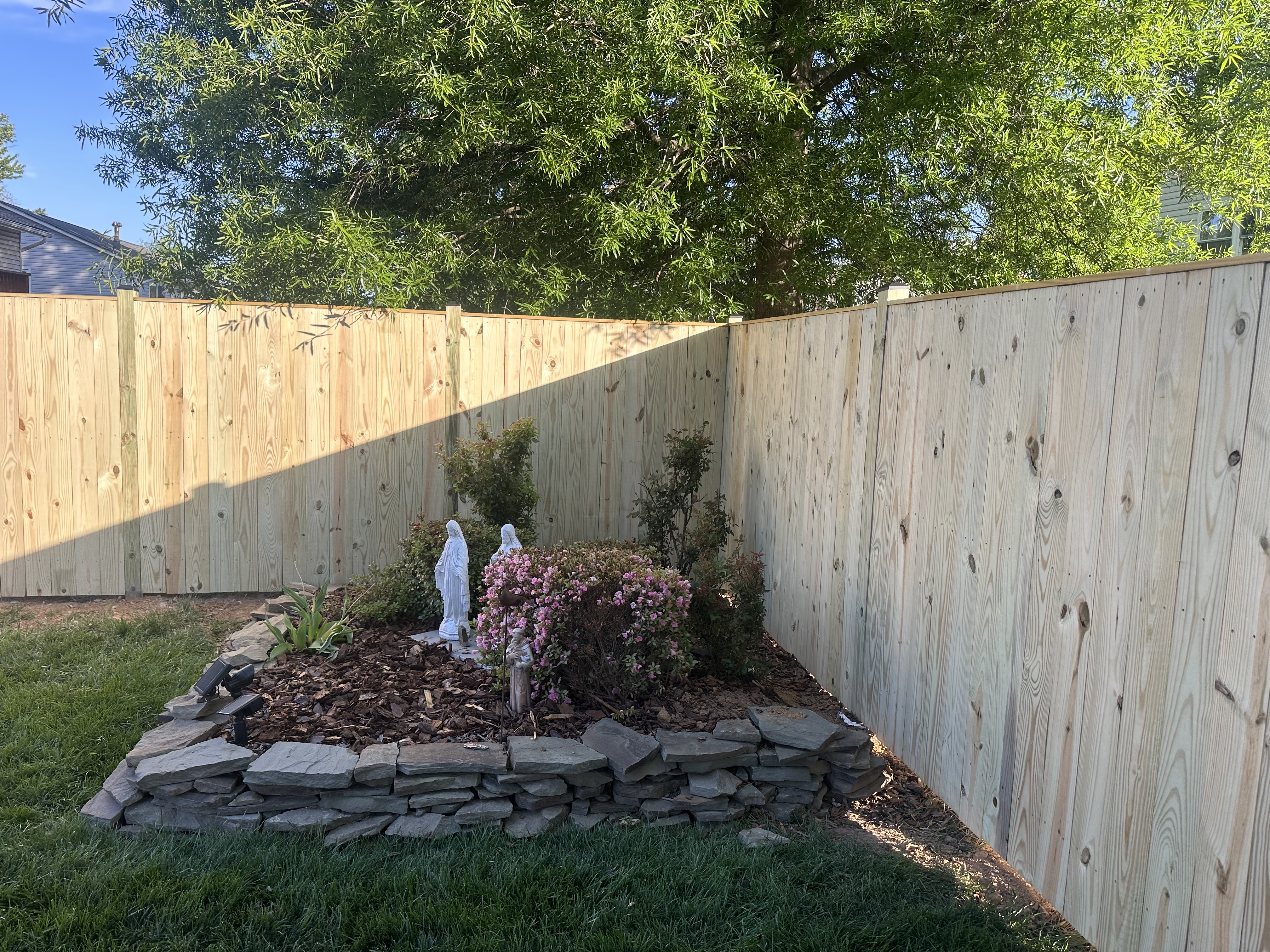 Custom wood fence build by Ventura Home Improvement