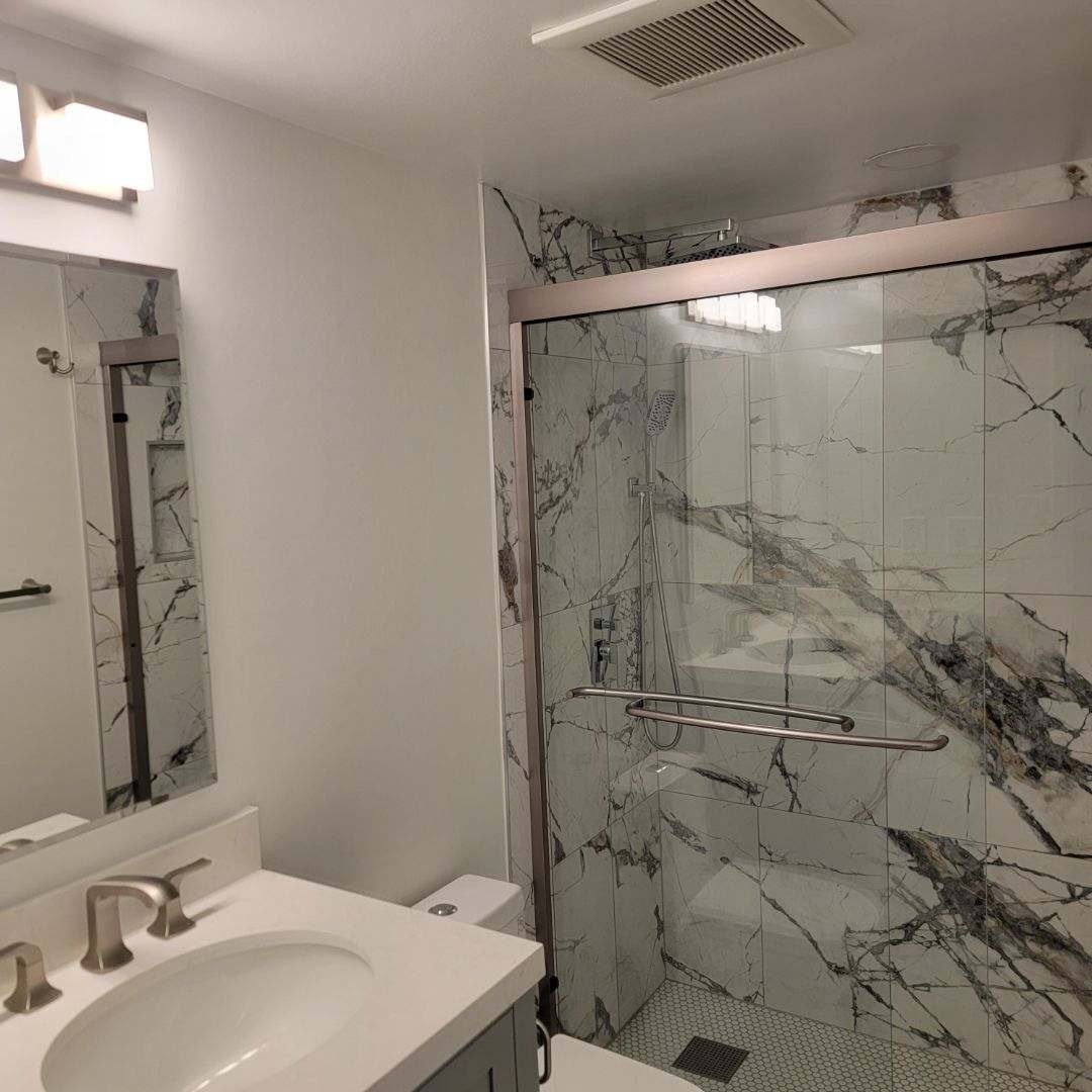 Black and white contrast tile shower Northern Virginia