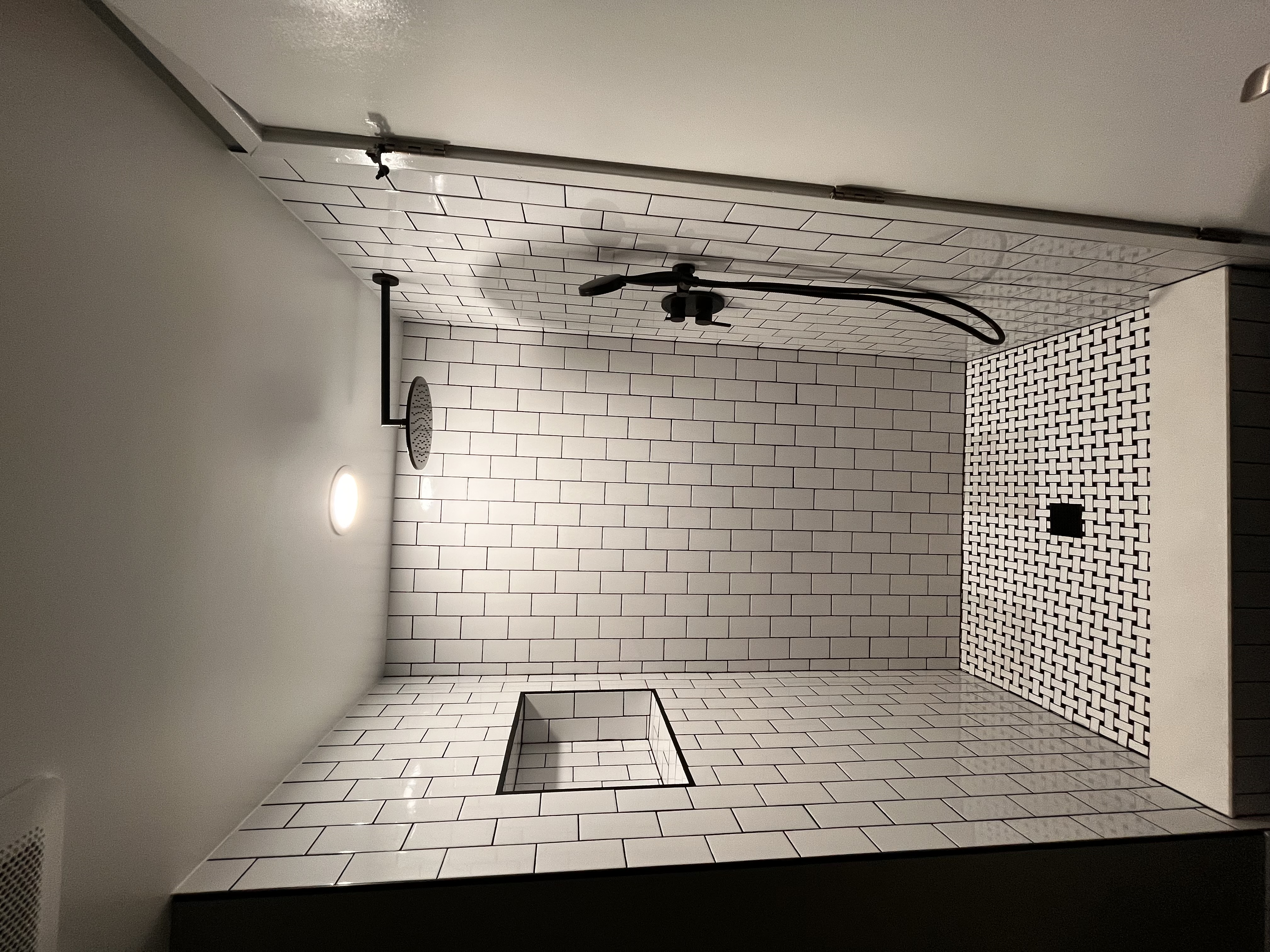 White shower renovation with modern fixtures Northern Virginia